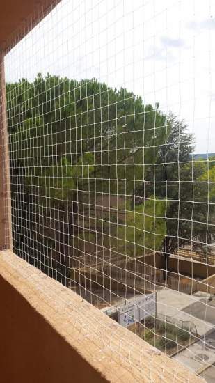 Pose de filet anti pigeon sur balcon à Aix en Provence 13100